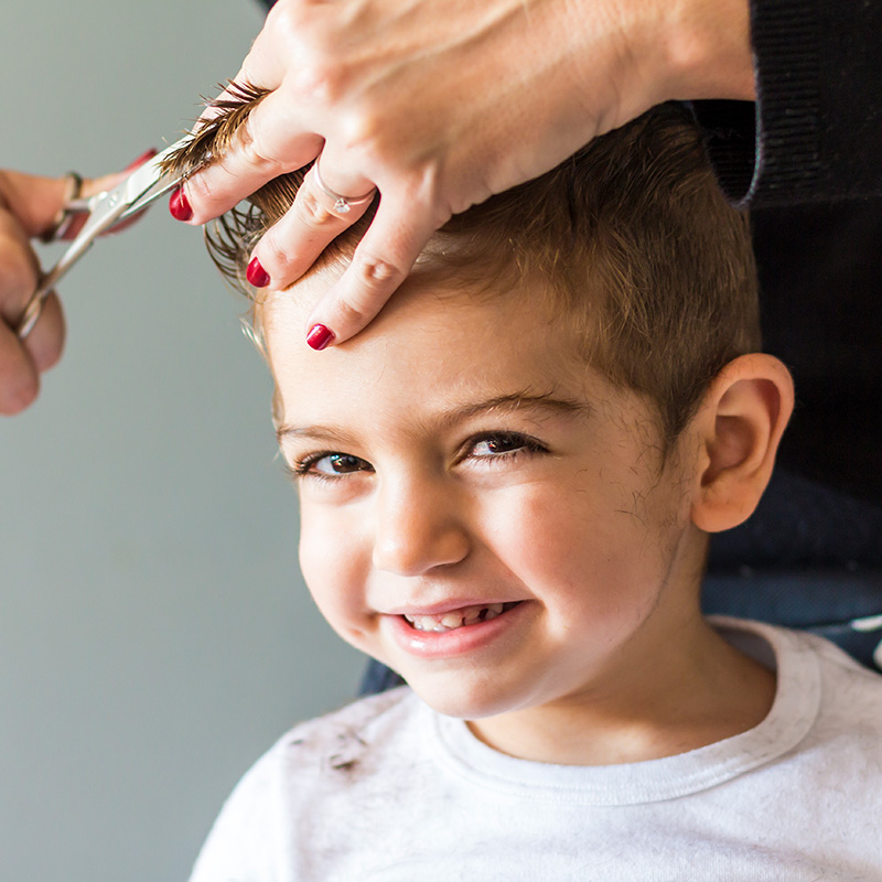 portrait-boy-having-haircut